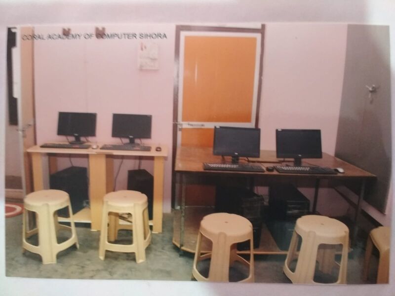 Modern desktops lined up in the main lab